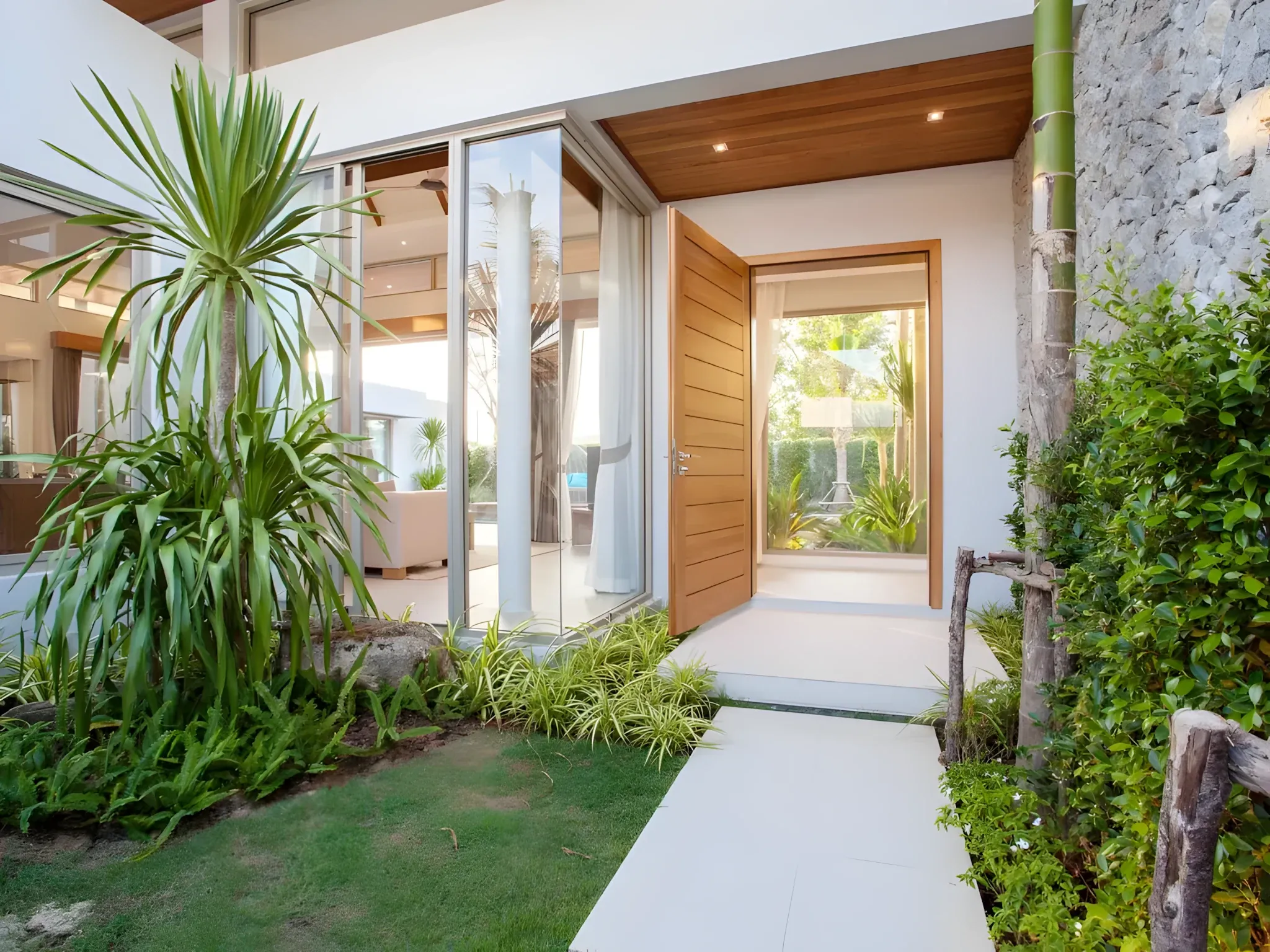 Newly planted entrance garden at a modern Tampa home